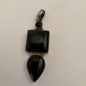 Pendant for necklace. Obsidian stones.